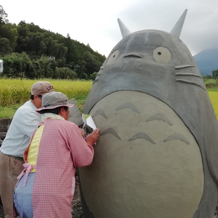 Japanese Grandparents making Totoro statue