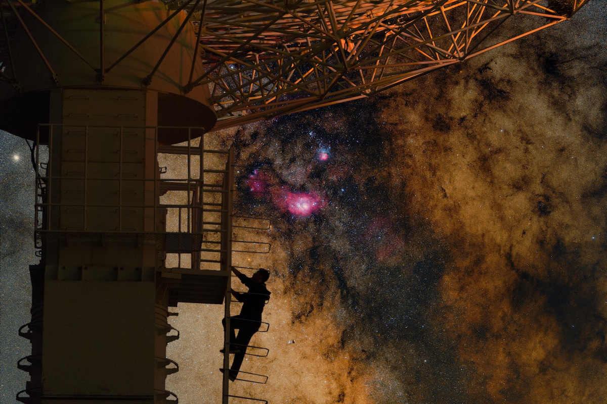 Climber Going Up a Radio Tower at Night