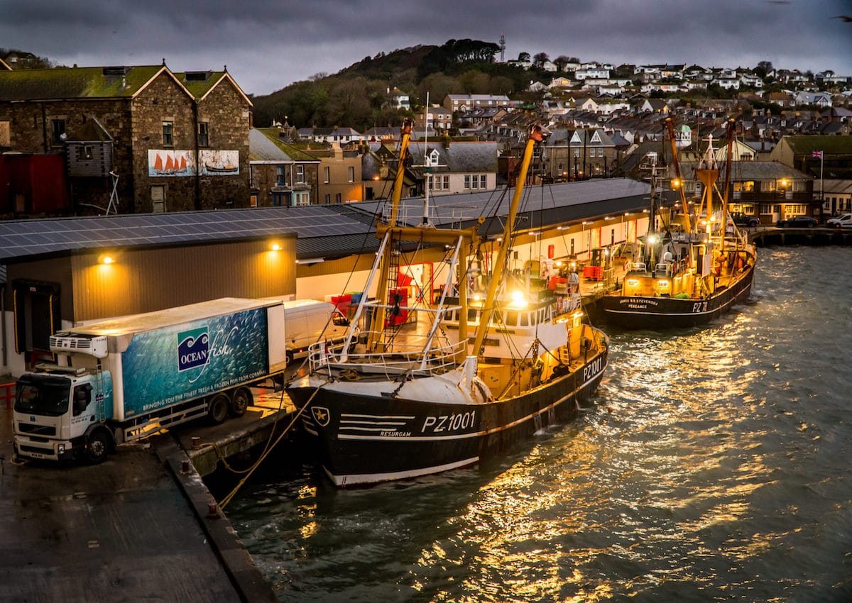 Beam Trawlers Landing At The Fish Market in Cornwall
