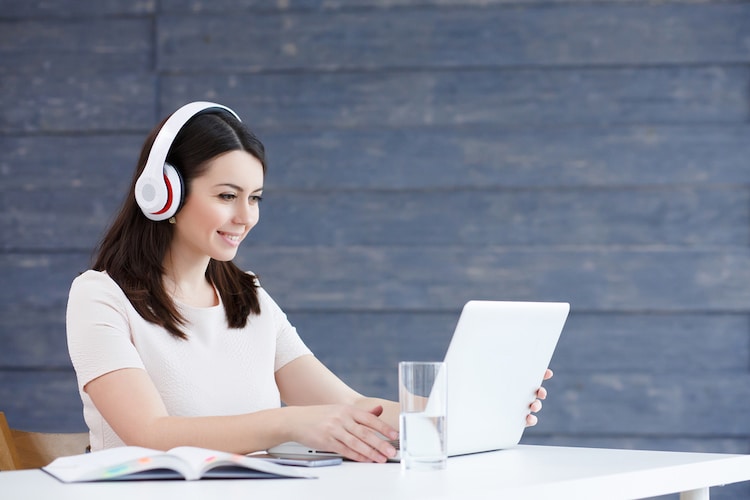 Young Woman Involved in e-Learning