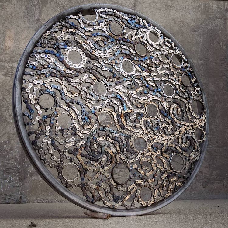 Esculturas de metal hechas con cadenas de bicicletas por Drew Evans