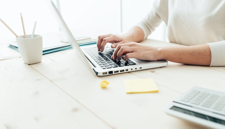 Person Typing on a Computer