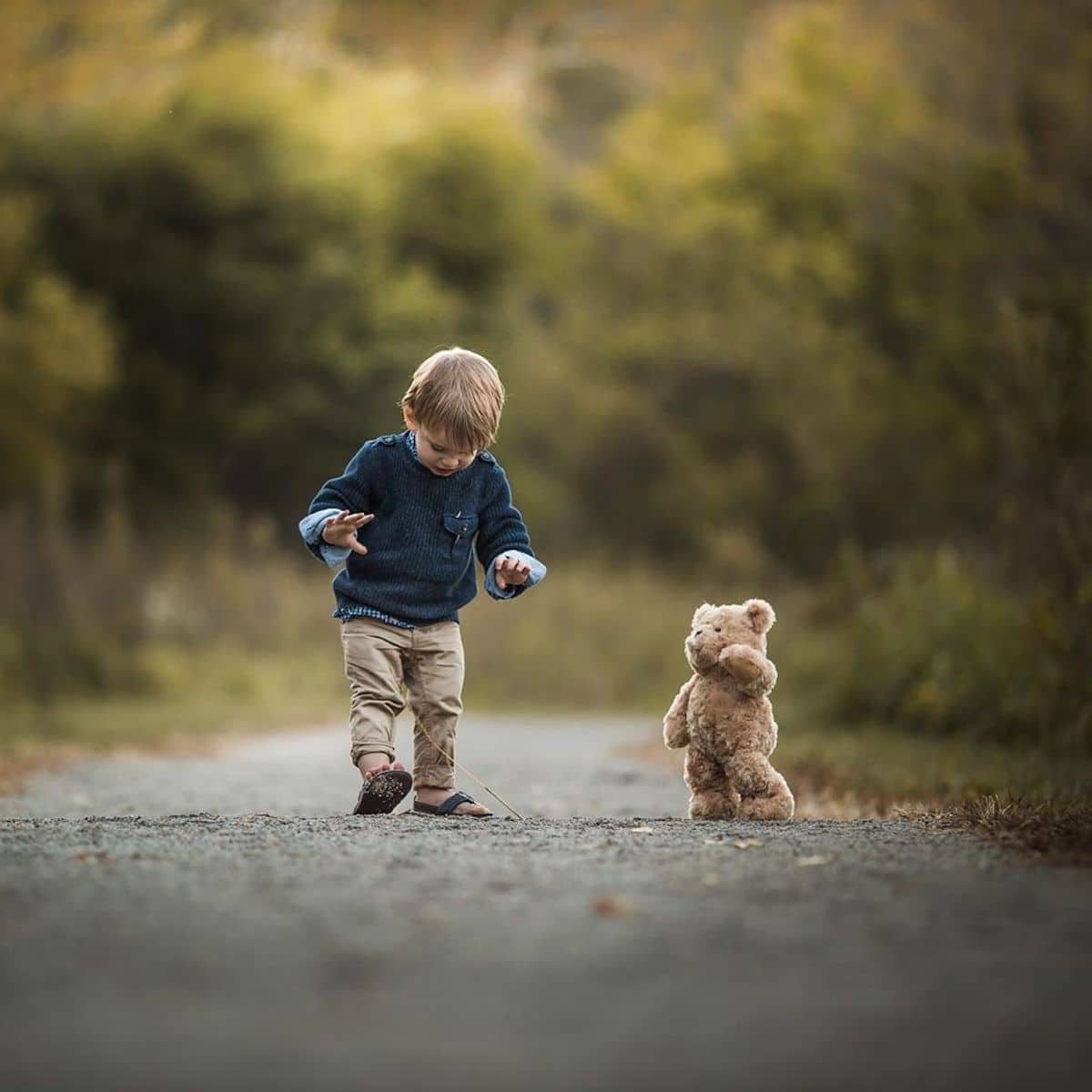 Boy Walking With Teddy Bear