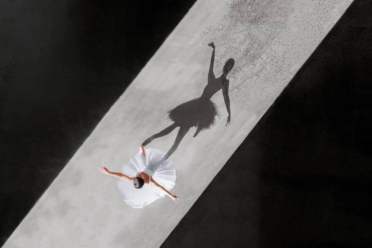 Ballerina Photographed with Shadow Cast on Pavement
