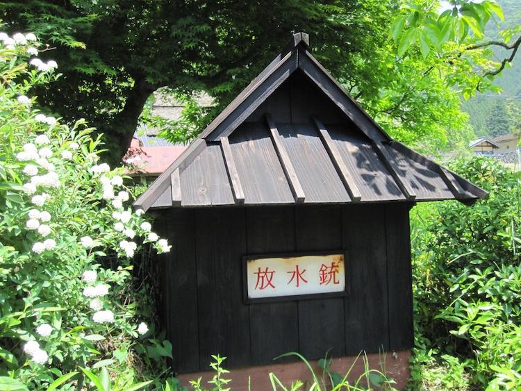 Small Huts Designed in a Local Style Hide the Fire Extinguishers