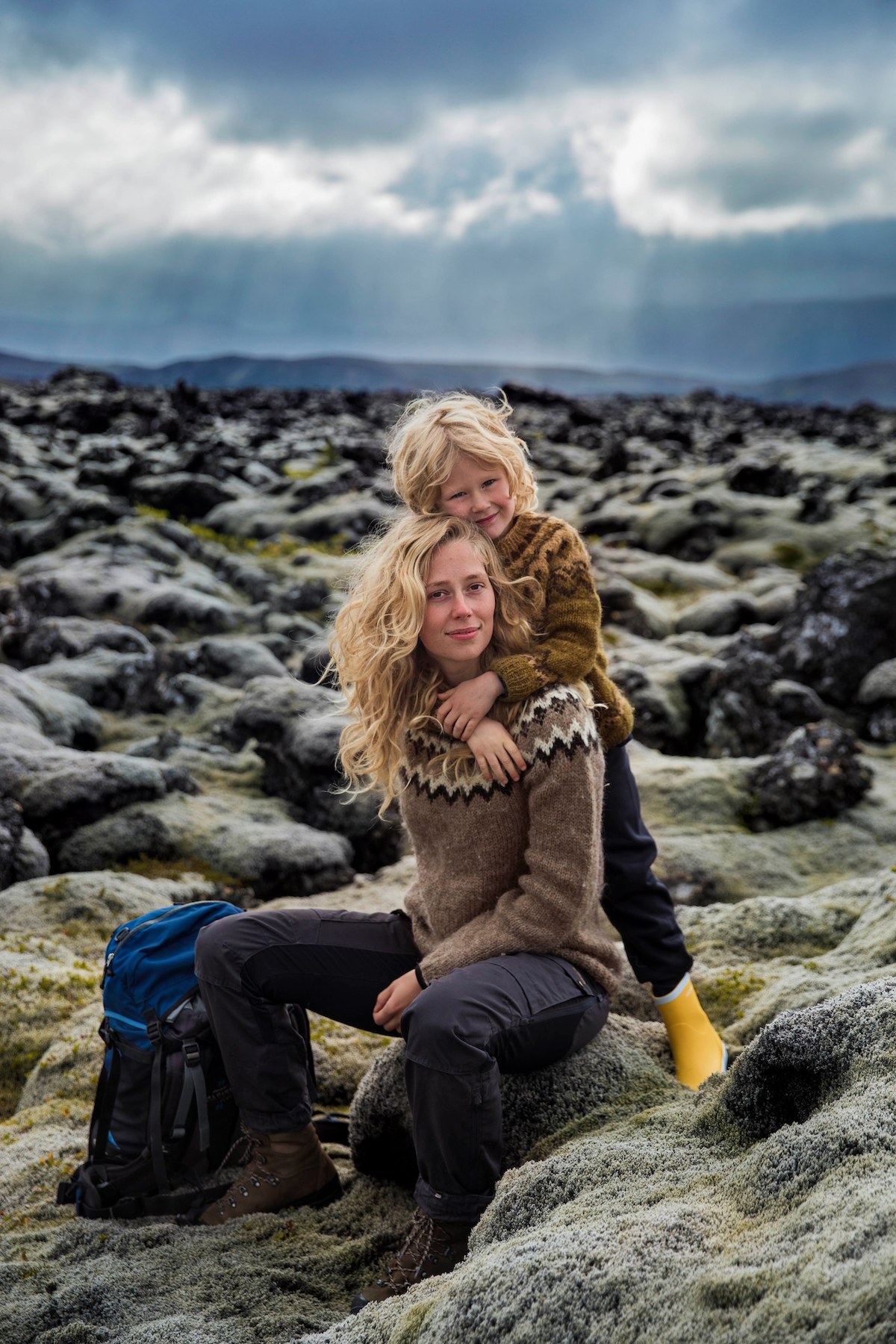 Blond woman with her son in Iceland