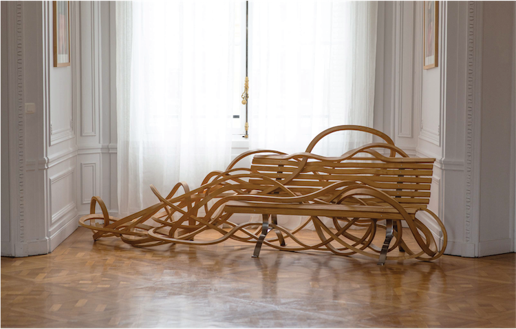 Artist Transforms Normal Wooden Benches Into Dynamic Curling Pieces of Art