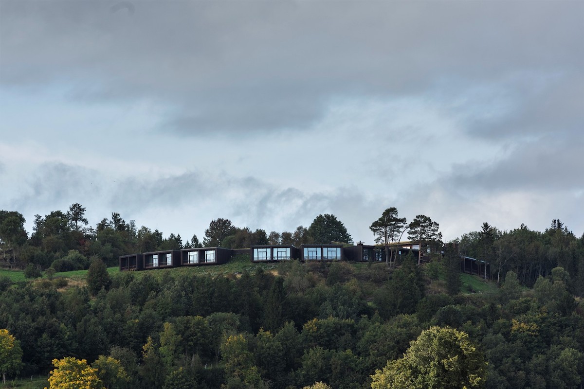 This Unique Hotel Is Camouflaged in a Grassy Nordic Landscape