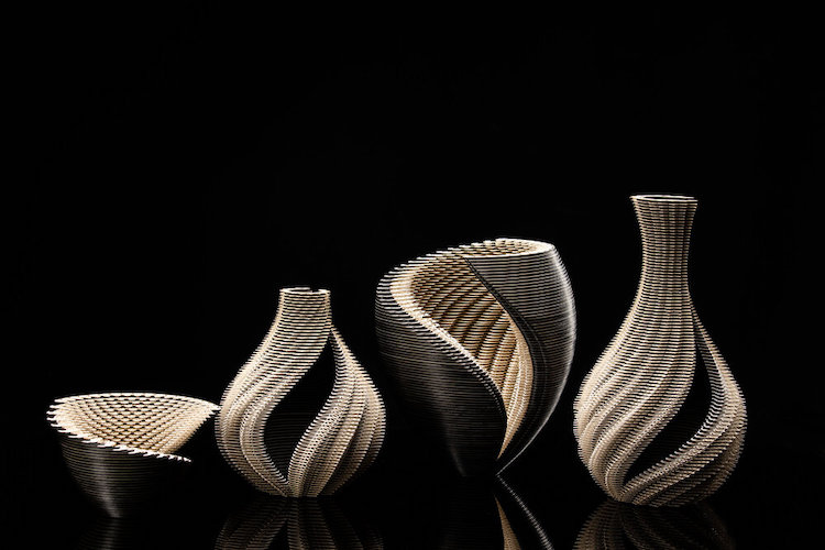 Symbio Vessels Intricate Laser Cut Paper Forms by Ibbini Studios