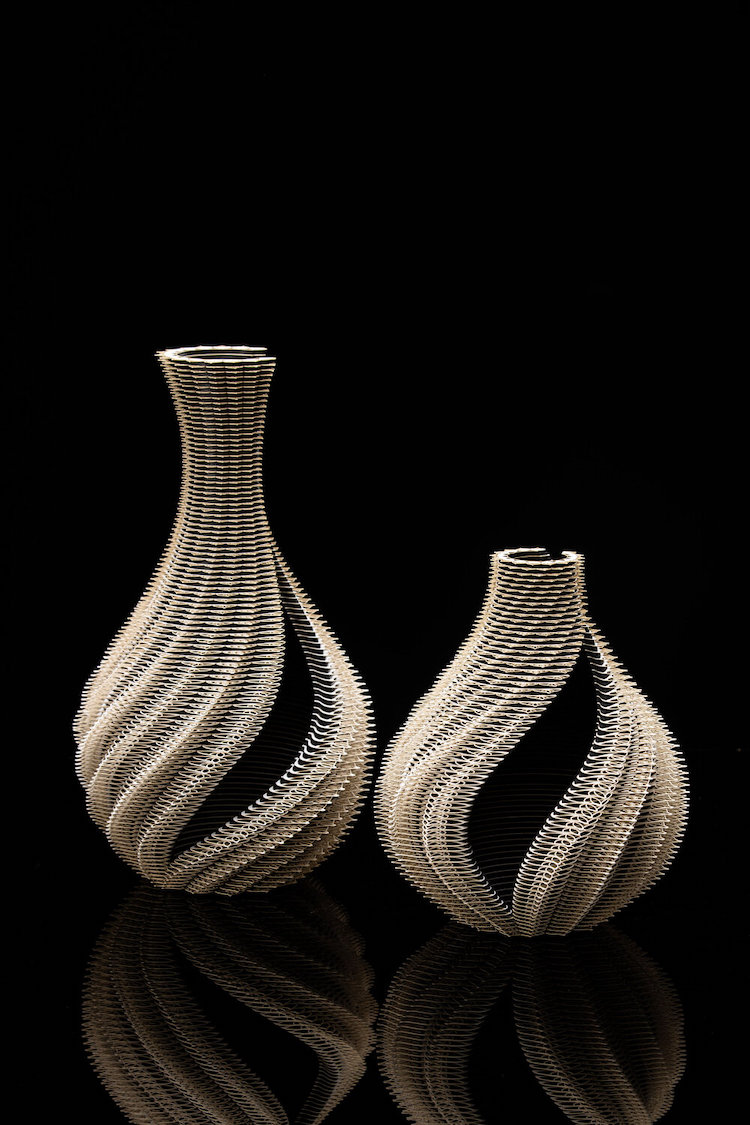 Symbio Vessels Intricate Laser Cut Paper Forms by Ibbini Studios