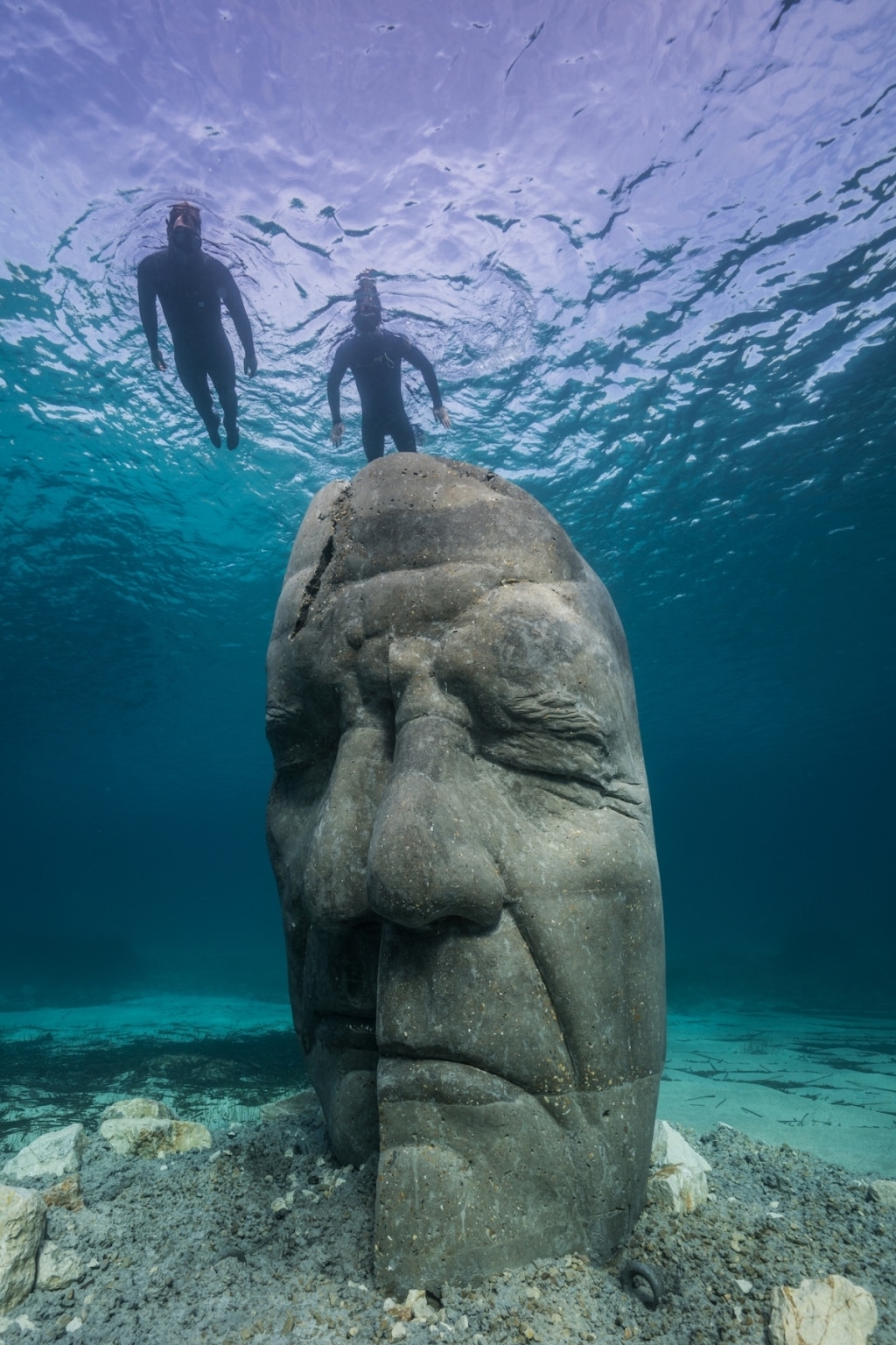 Jason deCaires Taylor Submerges Masks for Cannes Underwater Museum