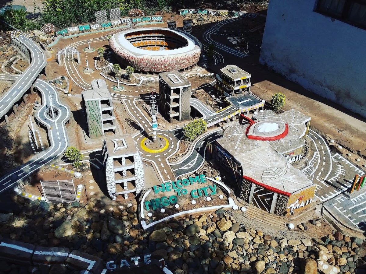 Designer Creates Incredible Mini City of his Home Town in South Africa Made of Recycled Material