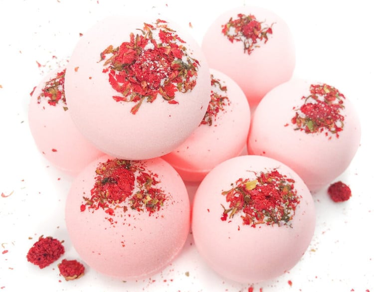pink cherry blossom bath bomb sprinkled with petals