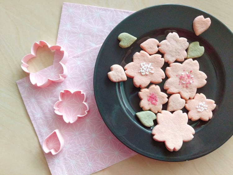 pink cherry blossom cookie cutters with finished cookies
