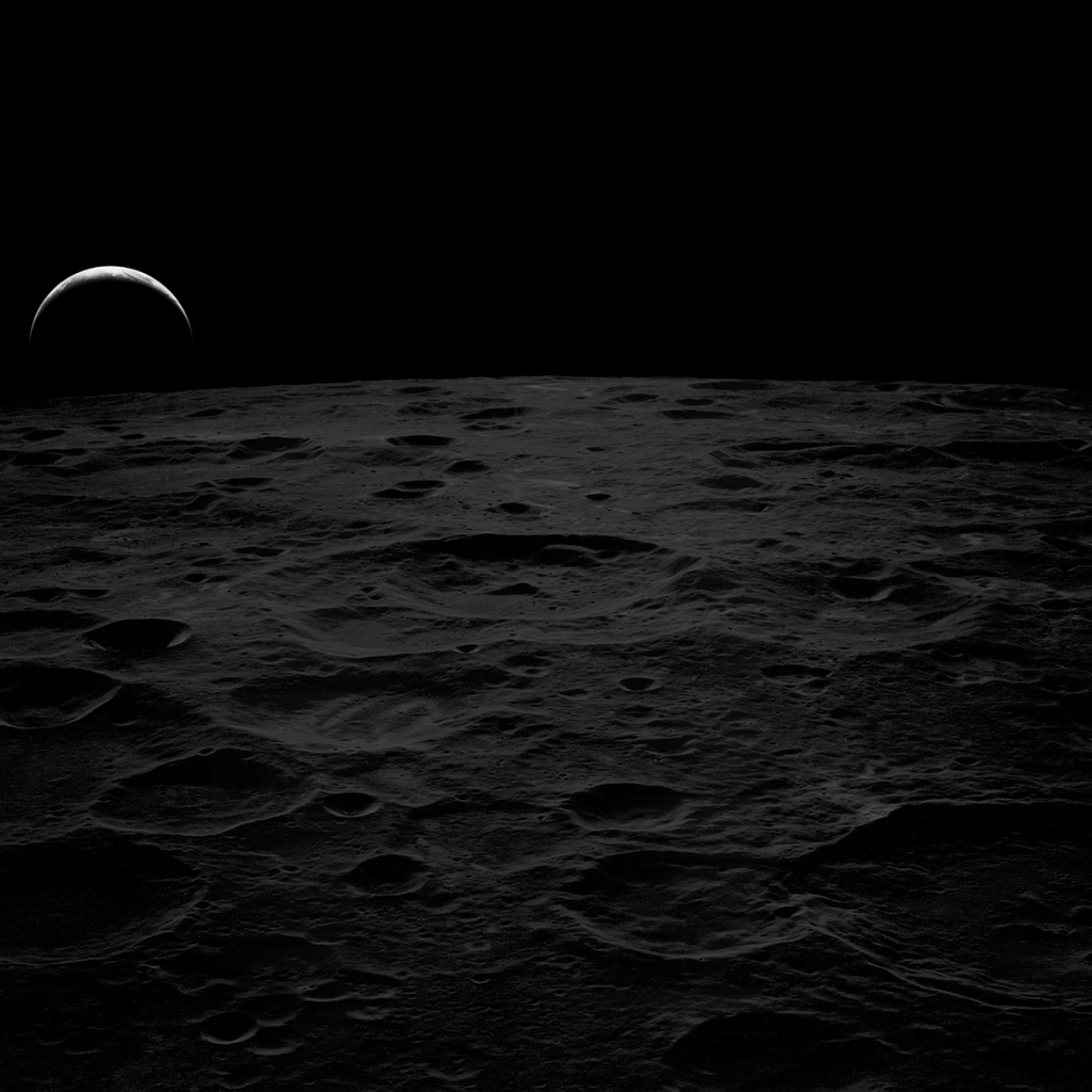 View of an Earth Rise Over Moon Surface