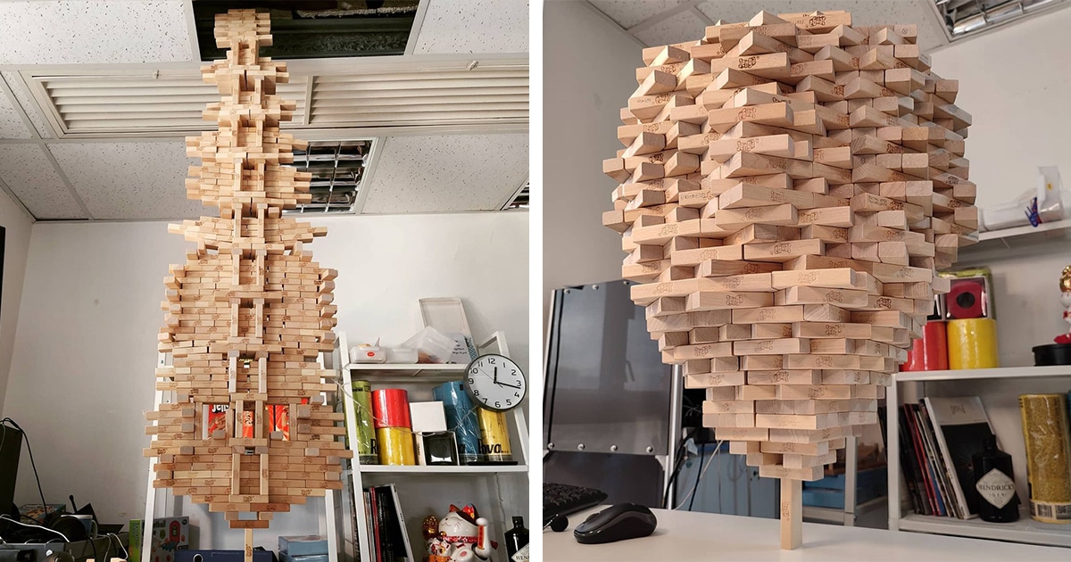 Guy Breaks His Own World Record for Balancing 1,512 Jenga on One