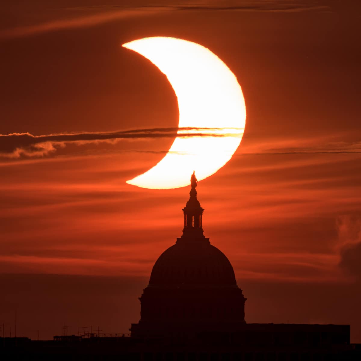 Partial Solar Eclipse Over the Capitol Building