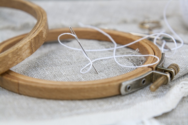 Embroidery Hoop and Thread on Fabric