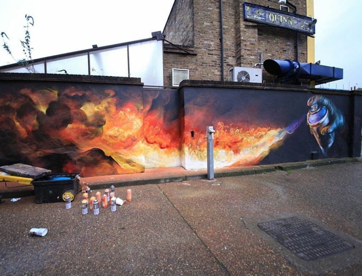 Mural of Spray Can Shooting Flames in Camden by Irony