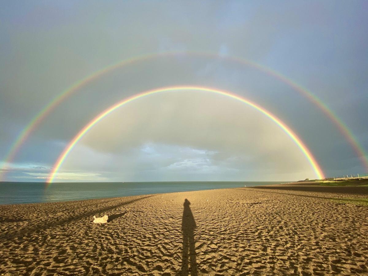 Double Rainbow Over a Beach