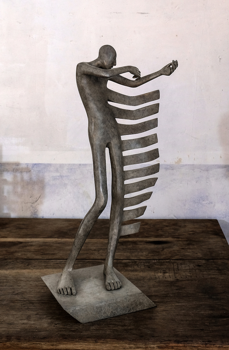 Esculturas bronce abstractas la figura humana en movimiento