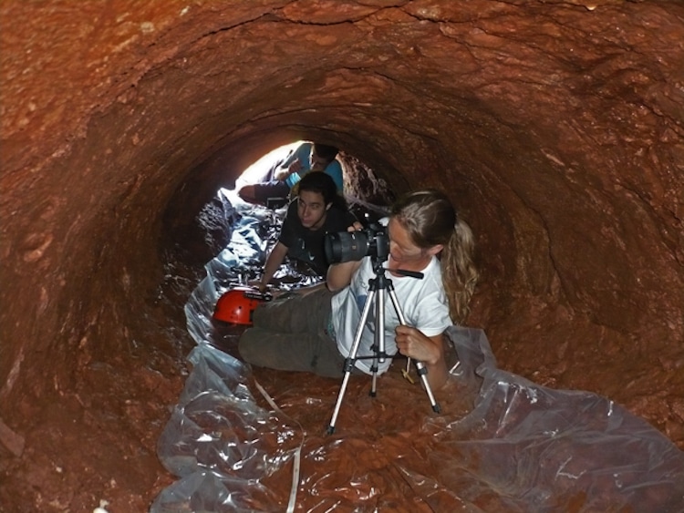 Researchers from Projeto Paleotocas Inside a Paleoburrow