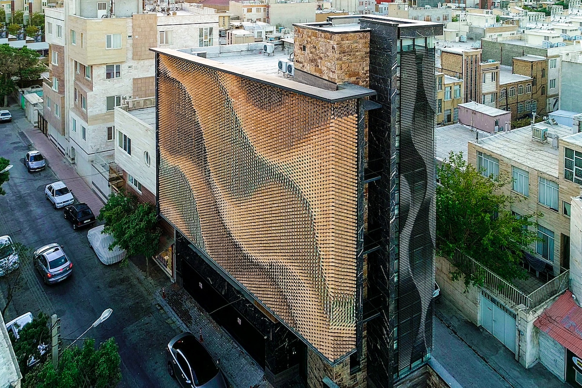 Brick Screen of Revolving Bricks Serai by Farhad Mirzaie and A.P.P Architects & Associates