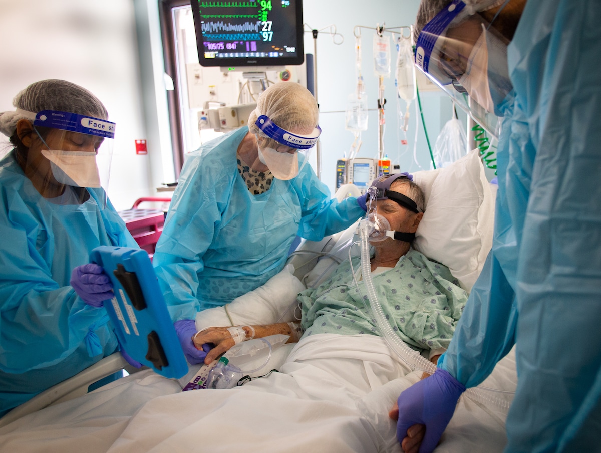 Chaplain Praying with Dying Covid-19 Patient