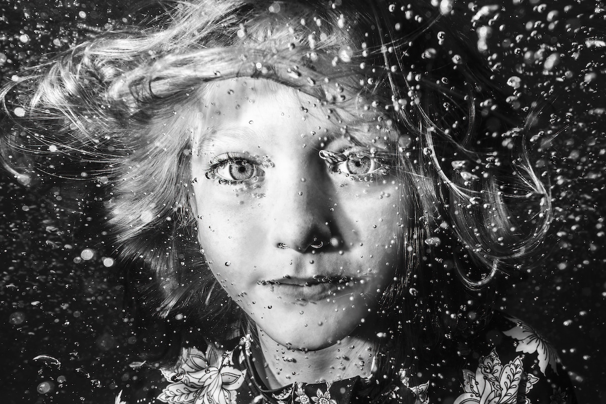 Black and White Underwater Portrait of a Young Girl