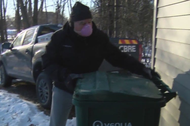 Mystery Garbage Man Brings in Neighborhood Garbage Bins on Trash Day