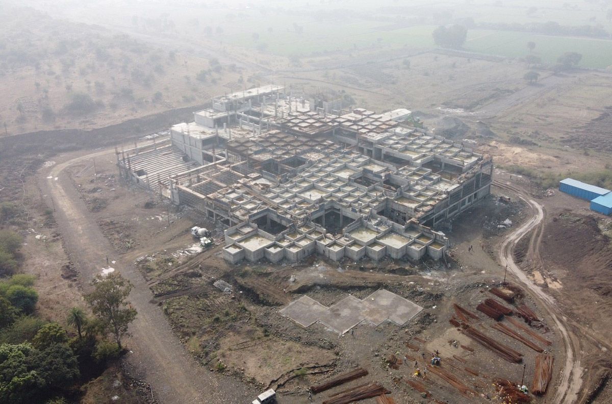 Construction Image of Stepped Green Roof at Prestige University Building by Sanjay Puri Architects