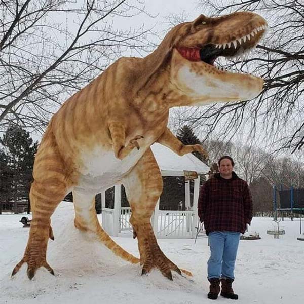 Minnesota Man Builds 12-Foot-Tall Snow Sculpture That Looks Like a Real T-Rex