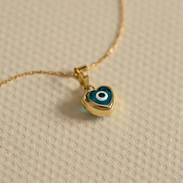 yellow gold evil eye heart necklace
