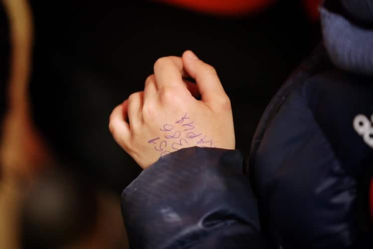 Phone Number Written on Hassan Al-Khalaf's Hand