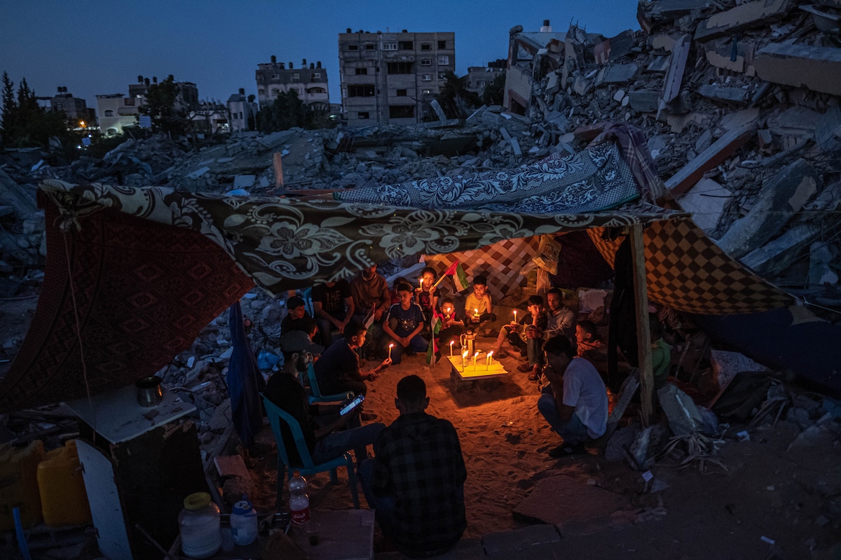 Palestinian Children Gathering in Gaza with Candles