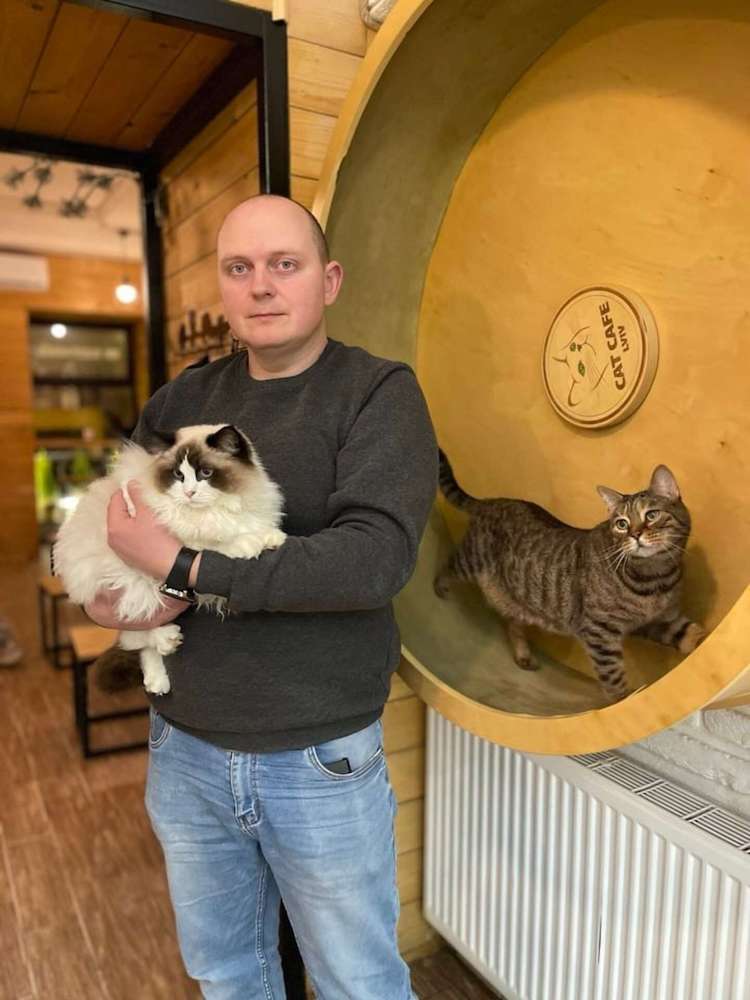 Cat Cafe Lviv Owner and Cats
