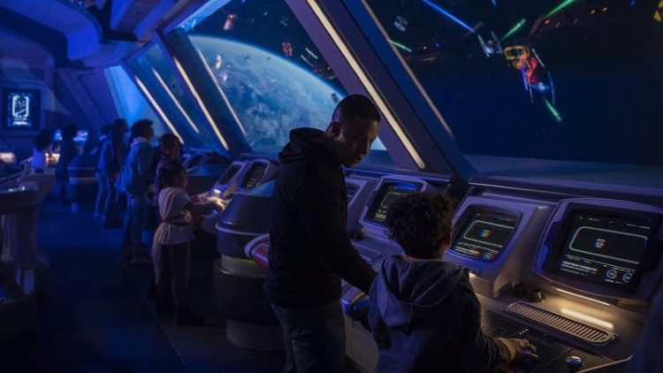 Passengers participating in Bridge Training aboard the Galactic Starcruiser