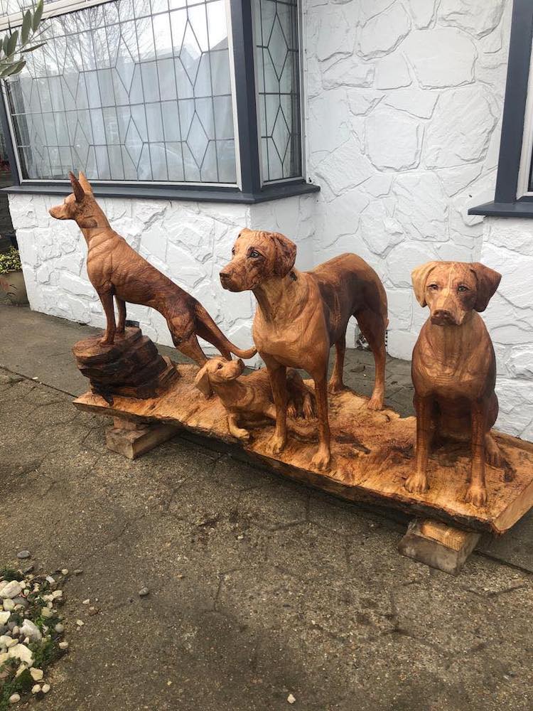 Wood Sculptures by Man and His Dog Carvings