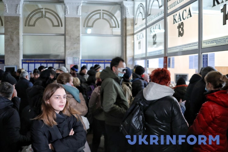 People Crowding Ticket Office at Train Station in Odesa