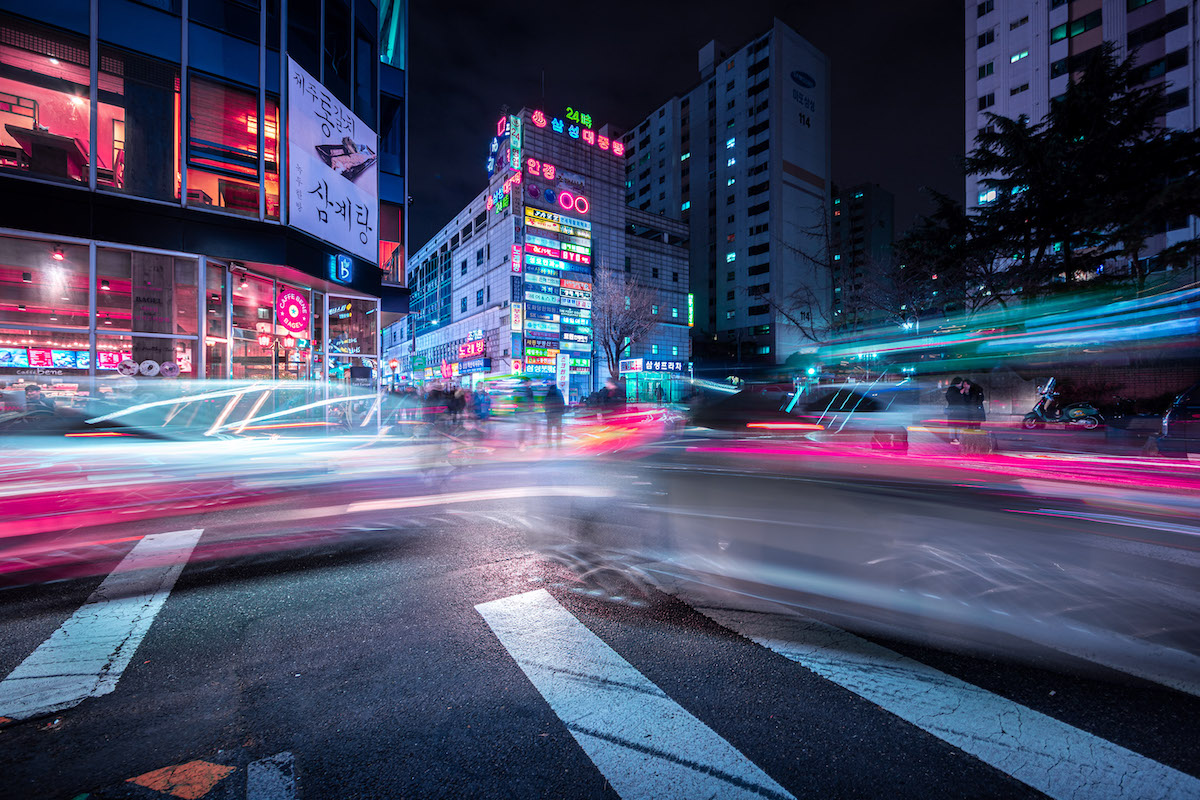 Cars Buzzing by Crosswalk in Seoul