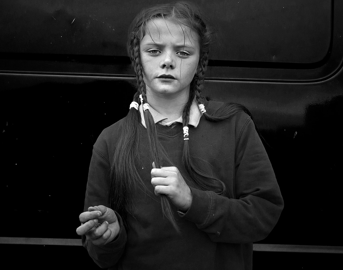 Black and White Photo of a Girl with Braids