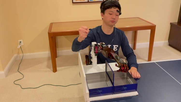 Benjamin Choi demonstrating the functionality of his robotic prosthetic arm.
