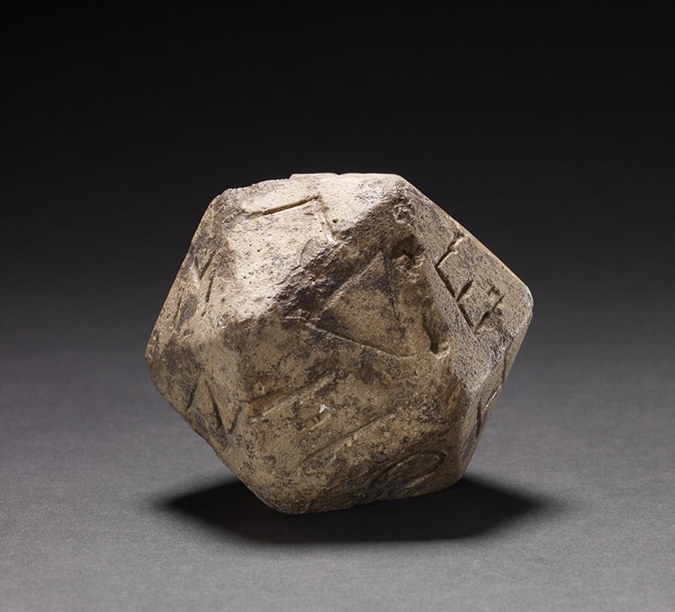 Twenty-sided die (icosahedron) with faces inscribed with Greek letters, Ptolemaic Period–Roman Period