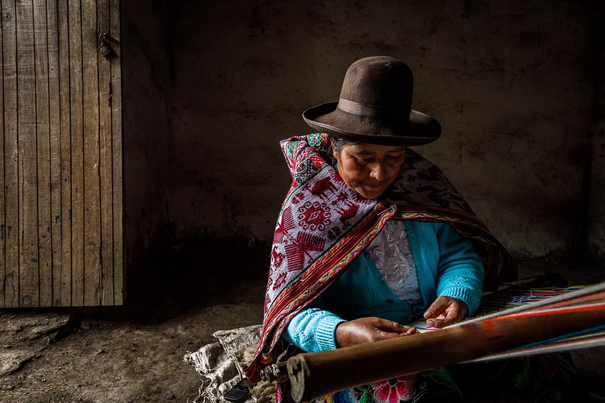 Artisan Weaving a Blanket in Peru