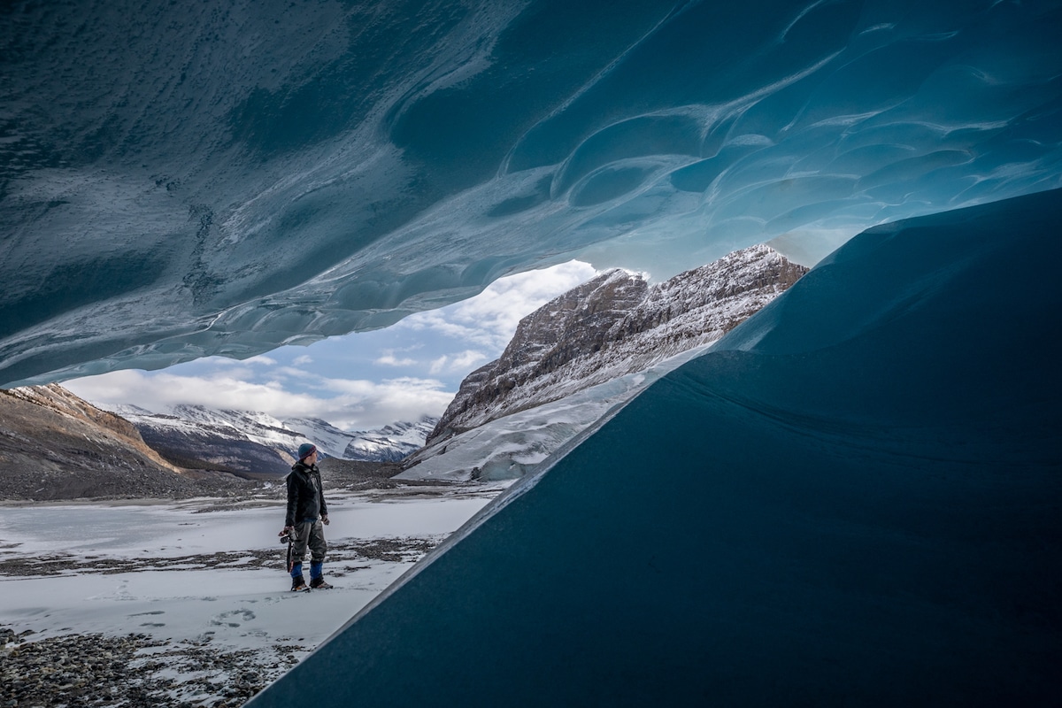 Man Exploring Icy Landscape in the Canadian Rockies