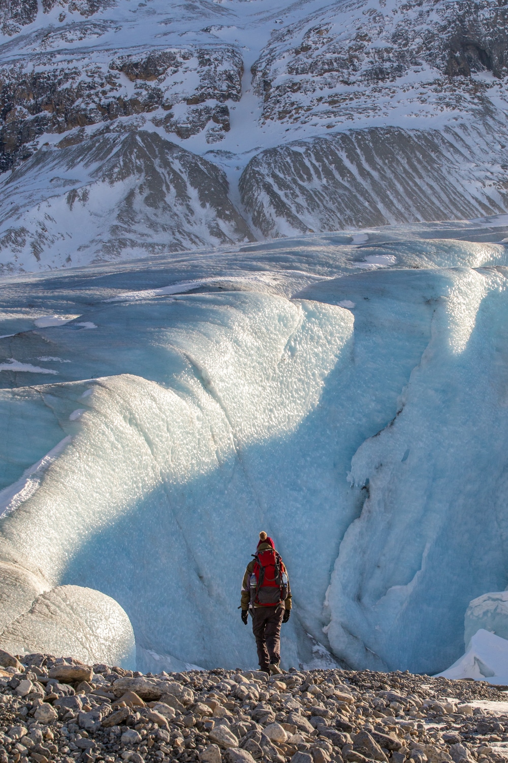Man Exploring Icy Landscape in the Canadian Rockies