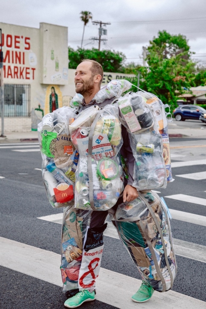 Man Wears a Custom Suit Showing All the Trash He Produced in a Month