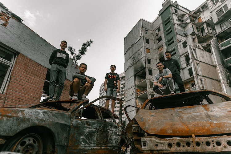 Graduation Photos of Students in Ukraine Standing in Ruins of War