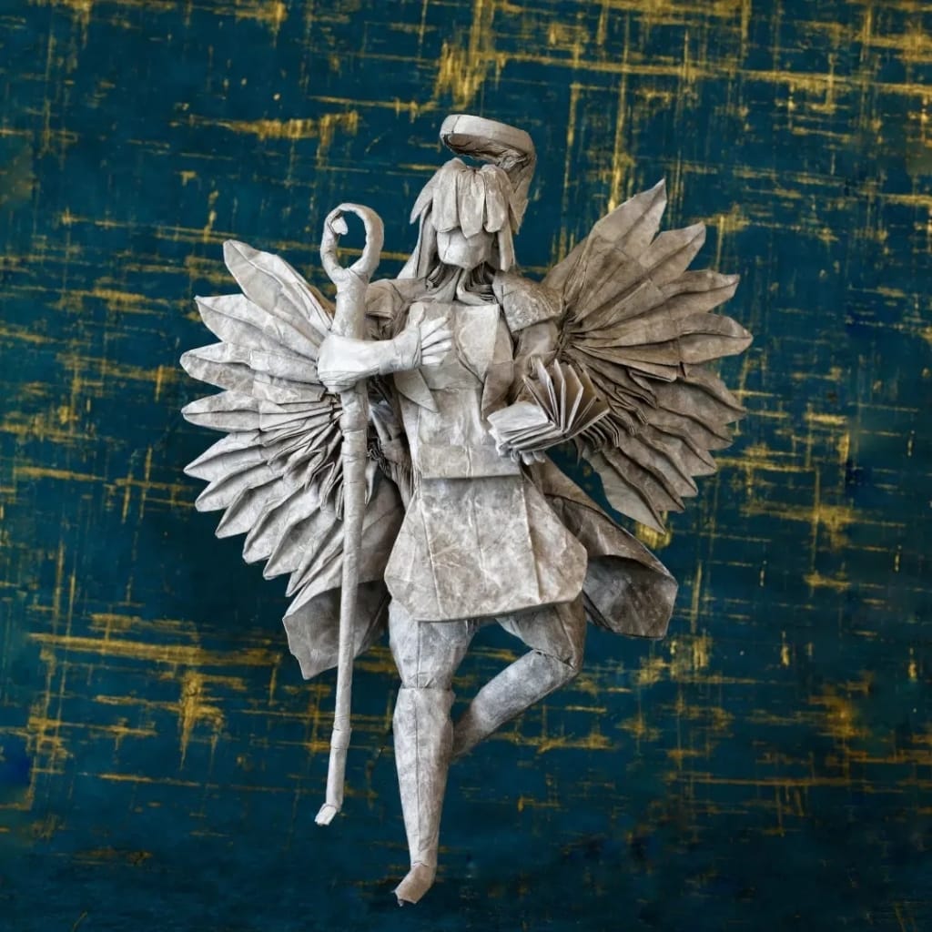 Artist Spent 15 Hours Folding Angel Origami From Single Sheet of Paper