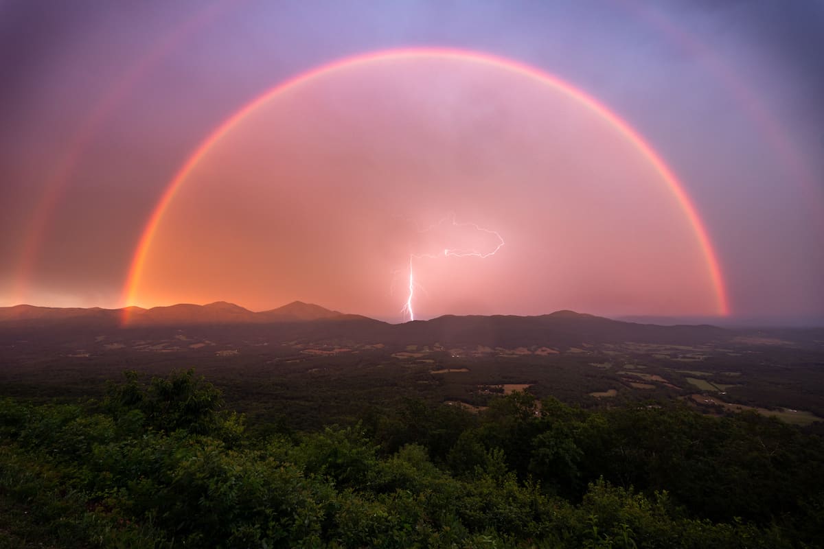 Stunning Photo Of Lightning Bolt Framed By A Double Rainbow